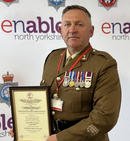 R SIGNALS Soldier saves footballer's life